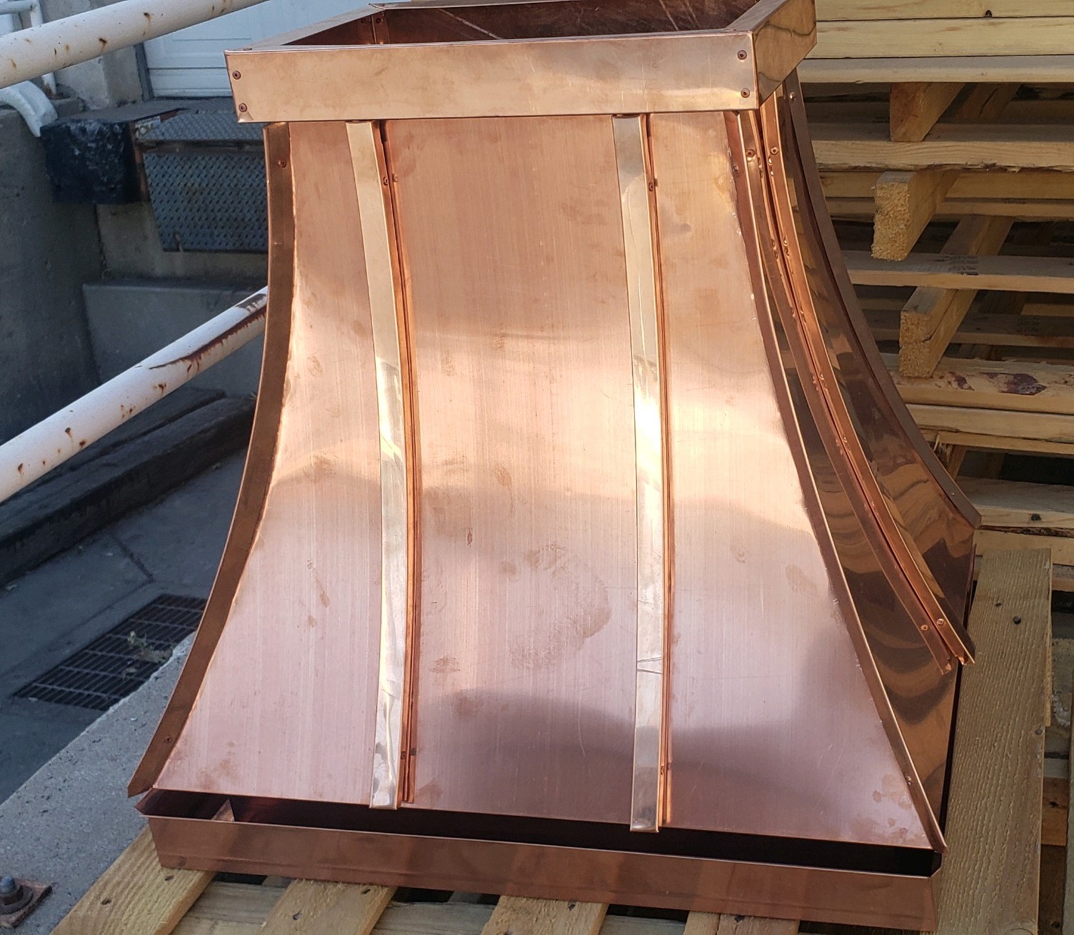 Custom copper chimney cap fabricated by Omega Metals in Ogden and Northern Utah